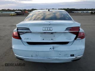 ✅ 2015 Audi A8 4.0T • VIN: WAU32AFD6FN002335 • Лот: 81556353. Опубликован ранее на Copart с пробегом 101 946 миль. Бесплатный доступ к архиву аукционных продаж из США и подробный отчёт об истории автомобиля на DreamBid. Изображение 6.