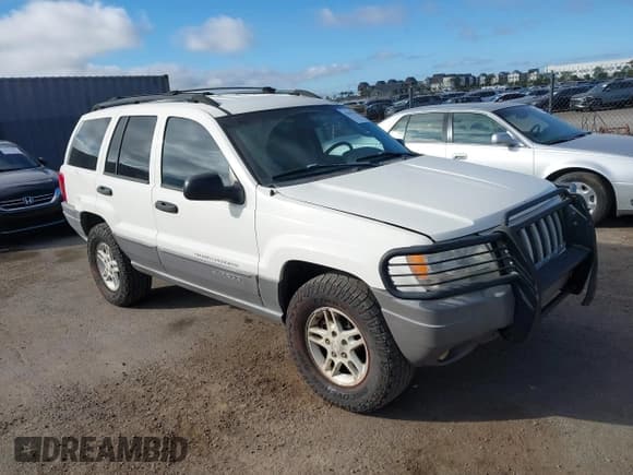 ✅ 2004 Jeep Grand Cherokee Laredo • VIN: 1J4GW48NX4C407942 • Лот: 43629318. Опубликован ранее на IAAI с пробегом 164 889 миль. Бесплатный доступ к архиву аукционных продаж из США и подробный отчёт об истории автомобиля на DreamBid. Изображение 1.