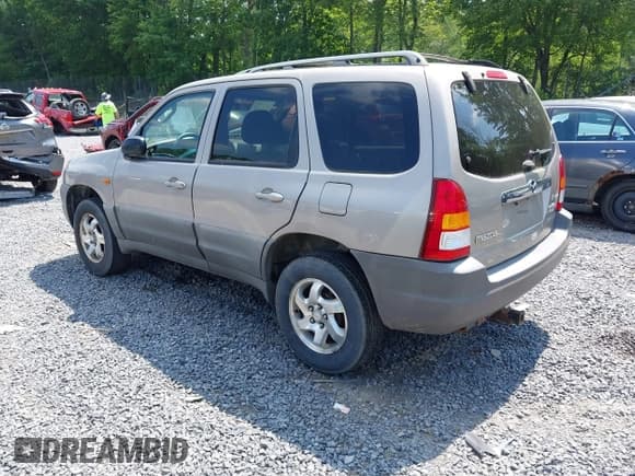 ✅ 2002 Mazda Tribute • VIN: 4F2YU06B42KM20366 • Lot: 42729832. Listed on IAAI with 170,543 mi. Free auction sales archive from the USA and detailed vehicle history report at DreamBid. Image 3.