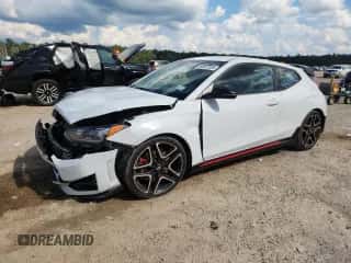 2020 Hyundai Veloster z VIN KMHT36AH7LU004857, wystawiony jako Copart lot #64057205 z przebiegiem 67 220 mil mil oraz Szkoda całkowita • Salvage title. Historia ofert i sprzedaży dostępna na DreamBid. Obrazek 1.