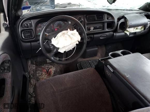 2001 Dodge 1500 z VIN 3B7HC13Z21G818434, wystawiony jako Copart lot #79247354 z przebiegiem 215 078 mil mil oraz Szkoda całkowita • Salvage title. Historia ofert i sprzedaży dostępna na DreamBid. Obrazek 8.