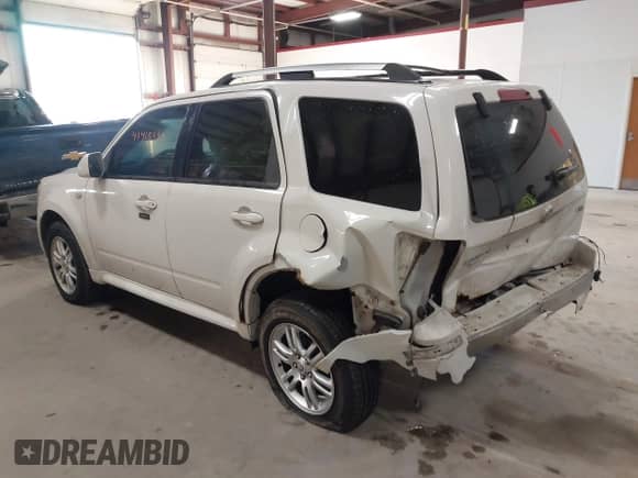 2009 Mercury Mariner Premier with VIN 4M2CU97729KJ00086, listed as a IAAI auction lot 41418490 with 167,486 mi miles and . Bid and sale history available at DreamBid. Image 3.