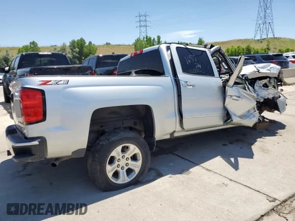 ✅ 2018 Chevrolet Silverado 1500 LT • VIN: 3GCUKREC2JG118874 • Лот: 59123584. Опубликован ранее на Copart с пробегом Не указан. Бесплатный доступ к архиву аукционных продаж из США и подробный отчёт об истории автомобиля на DreamBid. Изображение 3.