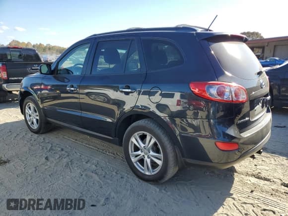 ✅ 2012 Hyundai Santa Fe Limited • VIN: 5XYZKDAG4CG118250 • Lot: 77872484. Listed on Copart with 165,557 mi. Free auction sales archive from the USA and detailed vehicle history report at DreamBid. Image 2.