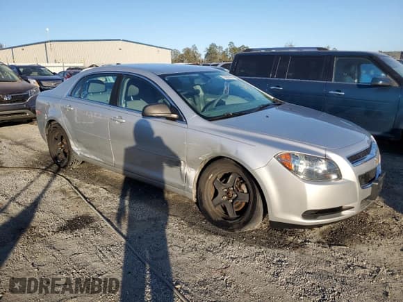 ✅ 2012 Chevrolet Malibu 1LS • VIN: 1G1ZB5E09CF357419 • Lot: 75650164. Listed on Copart with 150,496 mi. Free auction sales archive from the USA and detailed vehicle history report at DreamBid. Image 4.