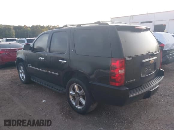 ✅ 2013 Chevrolet Tahoe LTZ • VIN: 1GNSCCE02DR165406 • Lot: 42798022. Listed on IAAI with 212,726 mi. Free auction sales archive from the USA and detailed vehicle history report at DreamBid. Image 3.