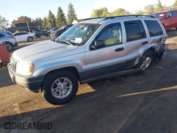 ✅ 2002 Jeep Grand Cherokee Laredo • VIN: 1J4GW48S22C256176 • Lot: 43420528. Listed on IAAI with 226,359 mi. Free auction sales archive from the USA and detailed vehicle history report at DreamBid. Image 2.