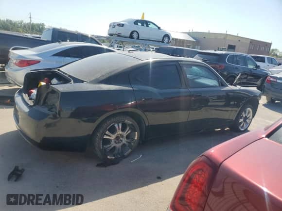 2009 Dodge Charger SRT-8 z VIN 2B3LA73W79H636864, wystawiony jako Copart lot #70624094 z przebiegiem Nie podano mil oraz Szkoda całkowita • Salvage title. Historia ofert i sprzedaży dostępna na DreamBid. Obrazek 3.