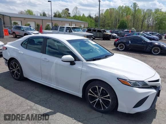 2019 Toyota Camry LE z VIN 4T1B11HK0KU754797, wystawiony jako IAAI lot #42032914 z przebiegiem 93 862 mil mil oraz . Historia ofert i sprzedaży dostępna na DreamBid. Obrazek 1.