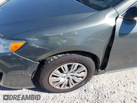 2012 Toyota Camry LE with VIN 4T1BF1FK7CU521893, listed as a IAAI auction lot 43343735 with 147,944 mi miles and . Bid and sale history available at DreamBid. Image 6.