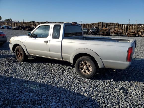 ✅ 2003 Nissan Frontier XE • VIN: 1N6DD26T03C402877 • Lot: 82664645. Listed on Copart with 225,822 mi. Free auction sales archive from the USA and detailed vehicle history report at DreamBid. Image 2.