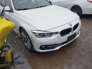 ✅ 2018 BMW 3 Series 330i • VIN: WBA8B9G53JNU57549 • Лот: 41521049. Опубликован ранее на IAAI с пробегом 63 557 миль. Бесплатный доступ к архиву аукционных продаж из США и подробный отчёт об истории автомобиля на DreamBid. Изображение 1.