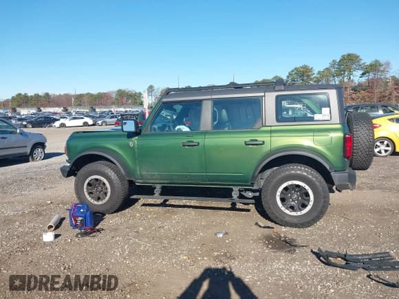 ✅ 2023 Ford Bronco Badlands • VIN: 1FMEE5DP5PLA93954 • Lot: 43720150. Listed on IAAI with 16,456 mi. Free auction sales archive from the USA and detailed vehicle history report at DreamBid. Image 13.