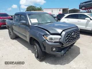 2022 Toyota Tacoma SR5 with VIN 3TMAZ5CN1NM167132, listed as a IAAI auction lot 42882564 with 62,756 mi miles and . Bid and sale history available at DreamBid. Image 1.