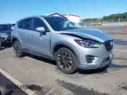 ✅ 2016 Mazda CX-5 Grand Touring • VIN: JM3KE4DY3G0609490 • Лот: 43417943. Опубликован ранее на IAAI с пробегом 243 145 миль. Бесплатный доступ к архиву аукционных продаж из США и подробный отчёт об истории автомобиля на DreamBid. Изображение 1.
