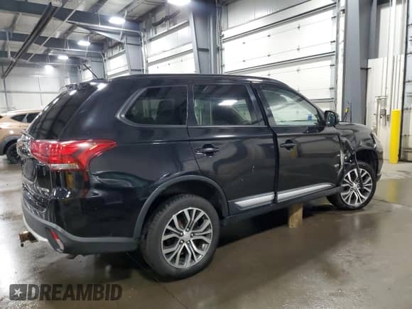 2016 Mitsubishi Outlander SE с VIN JA4AZ3A33GZ057264, выставлен на аукционе Copart как лот 69369875 с пробегом 162 081 миль миль и Списание • Salvage title. История ставок и продаж доступна на DreamBid. Изображение 3.