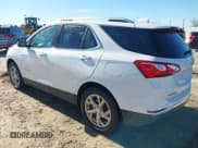 ✅ 2021 Chevrolet Equinox Premier • VIN: 3GNAXXEV2MS106680 • Лот: 43481192. Опубликован ранее на IAAI с пробегом 61 530 миль. Бесплатный доступ к архиву аукционных продаж из США и подробный отчёт об истории автомобиля на DreamBid. Изображение 3.