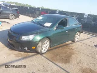 ✅ 2014 Chevrolet Cruze LTZ • VIN: 1G1PG5SB0E7299616 • Lot: 42916554. Listed on IAAI with 137,873 mi. Free auction sales archive from the USA and detailed vehicle history report at DreamBid. Image 2.