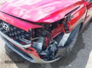 ✅ 2021 Hyundai Santa Fe SE • VIN: 5NMS14AJXMH336085 • Lot: 42301440. Listed on IAAI with 23,612 mi. Free auction sales archive from the USA and detailed vehicle history report at DreamBid. Image 6.