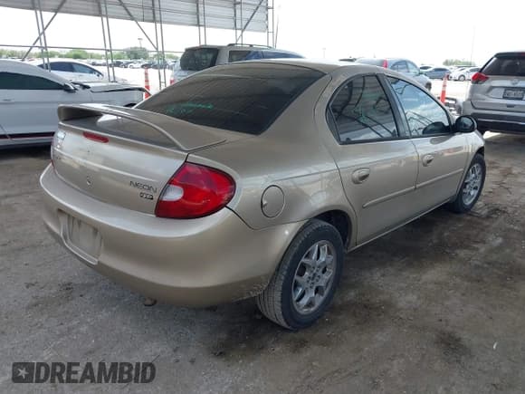 ✅ 2002 Dodge Neon ES • VIN: 1B3ES56C62D658479 • Lot: 42736769. Listed on IAAI with 70,443 mi. Free auction sales archive from the USA and detailed vehicle history report at DreamBid. Image 4.