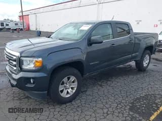 ✅ 2015 GMC Canyon 4WD SLE • VIN: 1GTG6BE32F1173730 • Lot: 43365666. Wystawiony na IAAI z przebiegiem 117 157 mil. Bezpłatny archiwum sprzedaży aukcyjnych z USA i szczegółowy raport historii pojazdu na DreamBid. Zdjęcie 2.