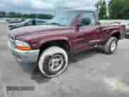 2000 Dodge Dakota Sport z VIN 1B7GG26N5YS650791, wystawiony jako Copart lot #63601765 z przebiegiem 80 841 mil mil oraz Szkoda całkowita • Salvage title. Historia ofert i sprzedaży dostępna na DreamBid. Obrazek 1.