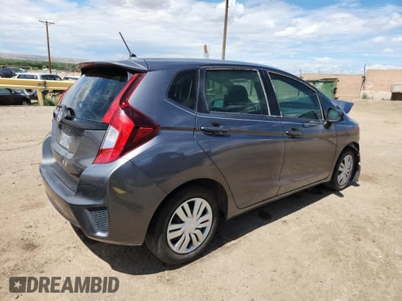 ✅ 2015 Honda Fit LX • VIN: 3HGGK5G59FM738510 • Lot: 70696295. Listed on Copart with 82,562 mi. Free auction sales archive from the USA and detailed vehicle history report at DreamBid. Image 3.