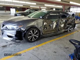 ✅ 2016 Nissan Maxima SL • VIN: 1N4AA6AP6GC428654 • Лот: 42197305. Опубликован ранее на Copart с пробегом Не указан. Бесплатный доступ к архиву аукционных продаж из США и подробный отчёт об истории автомобиля на DreamBid. Изображение 1.