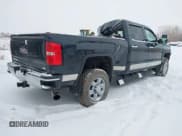 ✅ 2017 GMC Sierra 2500HD SLT • VIN: 1GT12TEY2HF155625 • Lot: 41453780. Listed on IAAI with 210,784 mi. Free auction sales archive from the USA and detailed vehicle history report at DreamBid. Image 4.