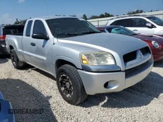 ✅ 2007 Mitsubishi Raider LS • VIN: 1Z7HC22K77S184893 • Лот: 63276613. Опубликован ранее на Copart с пробегом 198 342 миль. Бесплатный доступ к архиву аукционных продаж из США и подробный отчёт об истории автомобиля на DreamBid. Изображение 4.