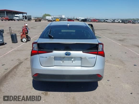 ✅ 2021 Toyota Prius L Eco • VIN: JTDKAMFU4M3148082 • Lot: 42246788. Listed on IAAI with 72,124 mi. Free auction sales archive from the USA and detailed vehicle history report at DreamBid. Image 17.