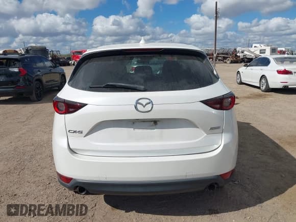 ✅ 2018 Mazda CX-5 Touring • VIN: JM3KFACM6J1409067 • Лот: 43716812. Опубликован ранее на IAAI с пробегом 76 489 миль. Бесплатный доступ к архиву аукционных продаж из США и подробный отчёт об истории автомобиля на DreamBid. Изображение 16.