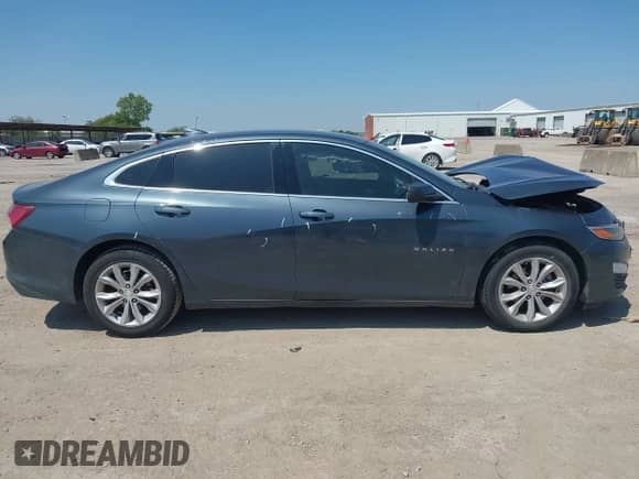 2019 Chevrolet Malibu LT z VIN 1G1ZD5ST7KF179775, wystawiony jako IAAI lot #43187625 z przebiegiem 126 840 mil mil oraz . Historia ofert i sprzedaży dostępna na DreamBid. Obrazek 13.