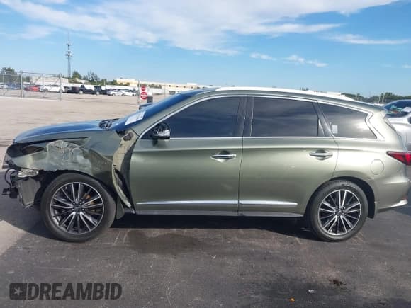✅ 2016 Infiniti QX60 • VIN: 5N1AL0MN2GC519699 • Lot: 43613400. Listed on IAAI with 146,118 mi. Free auction sales archive from the USA and detailed vehicle history report at DreamBid. Image 15.