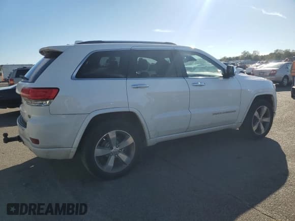 ✅ 2014 Jeep Grand Cherokee Overland • VIN: 1C4RJFCG5EC417393 • Lot: 86143725. Listed on Copart with 211,668 mi. Free auction sales archive from the USA and detailed vehicle history report at DreamBid. Image 3.