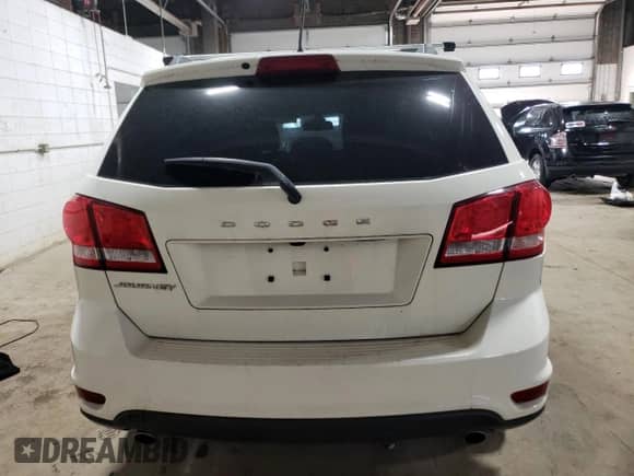 2018 Dodge Journey SXT с VIN 3C4PDCBG8JT505352, выставлен на аукционе Copart как лот 85951485 с пробегом 107 041 миль миль и Чистый • Clean title. История ставок и продаж доступна на DreamBid. Изображение 6.