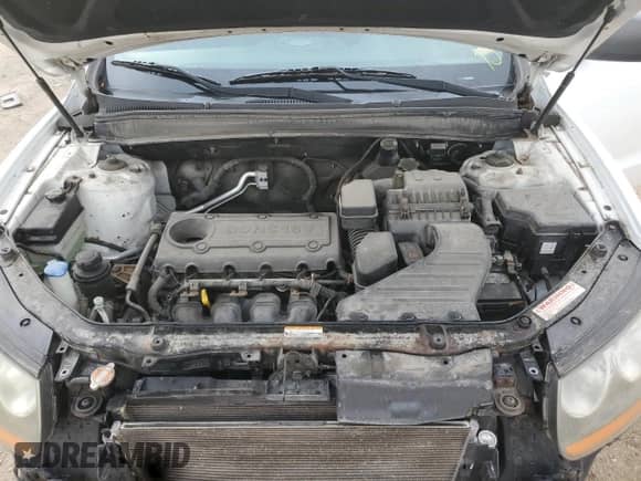 2011 Hyundai Santa Fe GLS z VIN 5XYZG3AB1BG084444, wystawiony jako Copart lot #86159525 z przebiegiem 105 364 mil mil oraz Szkoda całkowita • Salvage title. Historia ofert i sprzedaży dostępna na DreamBid. Obrazek 11.