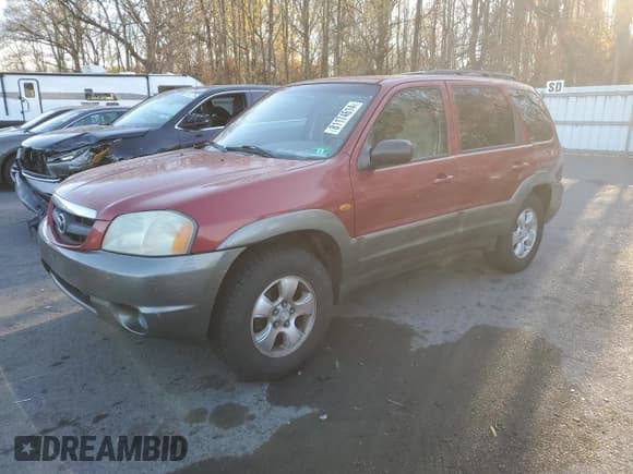 ✅ 2001 Mazda Tribute LX • VIN: 4F2CU08111KM19933 • Lot: 81174614. Listed on Copart with 209,736 mi. Free auction sales archive from the USA and detailed vehicle history report at DreamBid. Image 1.
