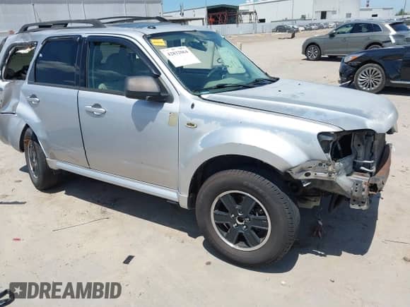 2010 Mercury Mariner z VIN 4M2CN8B75AKJ13322, wystawiony jako IAAI lot #42832064 z przebiegiem 205 074 mil mil oraz . Historia ofert i sprzedaży dostępna na DreamBid. Obrazek 19.