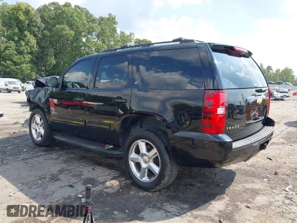 2012 Chevrolet Tahoe LT z VIN 1GNSCBE06CR215264, wystawiony jako IAAI lot #43274793 z przebiegiem 245 873 mil mil oraz . Historia ofert i sprzedaży dostępna na DreamBid. Obrazek 3.