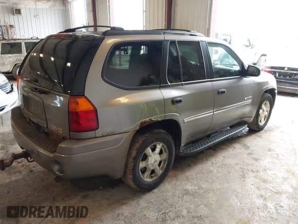 ✅ 2006 GMC Envoy SLE • VIN: 1GKDT13S762250462 • Lot: 42521572. Listed on IAAI with 282,232 mi. Free auction sales archive from the USA and detailed vehicle history report at DreamBid. Image 4.