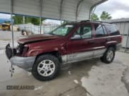 ✅ 2000 Jeep Grand Cherokee Laredo • VIN: 1J4GW48S1YC389472 • Lot: 81714815. Listed on Copart with 266,871 mi. Free auction sales archive from the USA and detailed vehicle history report at DreamBid. Image 1.