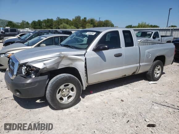 2005 Dodge Dakota ST с VIN 1D7HE22K45S153545, выставлен на аукционе Copart как лот 70364364 с пробегом 169 212 миль миль и Списание • Salvage title. История ставок и продаж доступна на DreamBid. Изображение 1.