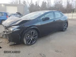 ✅ 2023 Toyota Prius LE • VIN: JTDACAAU9P3005290 • Lot: 76371313. Listed on Copart with 12,584 mi. Free auction sales archive from the USA and detailed vehicle history report at DreamBid. Image 1.