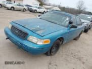 ✅ 2000 Ford Crown Victoria Police Interceptor • VIN: 2FAFP71W4YX136846 • Лот: 41715363. Опубликован ранее на IAAI с пробегом 335 956 миль. Бесплатный доступ к архиву аукционных продаж из США и подробный отчёт об истории автомобиля на DreamBid. Изображение 2.