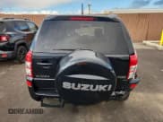 ✅ 2009 Suzuki Grand Vitara • VIN: JS3TE044594100565 • Лот: 93714445. Опубликован ранее на Copart с пробегом 56 981 миль. Бесплатный доступ к архиву аукционных продаж из США и подробный отчёт об истории автомобиля на DreamBid. Изображение 6.