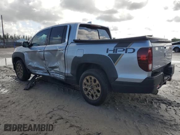 ✅ 2021 Honda Ridgeline RTL-E • VIN: 5FPYK3F74MB013450 • Lot: 55655845. Wystawiony na Copart z przebiegiem 43 697 mil. Bezpłatny archiwum sprzedaży aukcyjnych z USA i szczegółowy raport historii pojazdu na DreamBid. Zdjęcie 2.