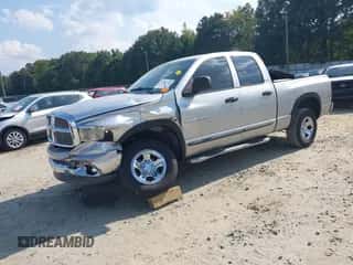 2002 Dodge 1500 z VIN 3D7HU18N12G151642, wystawiony jako IAAI lot #43249745 z przebiegiem 230 070 mil mil oraz . Historia ofert i sprzedaży dostępna na DreamBid. Obrazek 2.