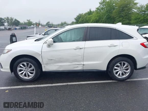 ✅ 2018 Acura RDX • VIN: 5J8TB4H31JL018201 • Lot: 42459595. Listed on IAAI with 106,523 mi. Free auction sales archive from the USA and detailed vehicle history report at DreamBid. Image 14.