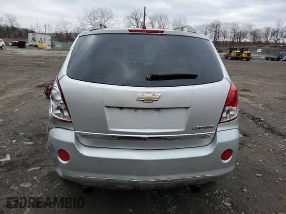 2012 Chevrolet Captiva Sport LTZ с VIN 3GNFL4E58CS625456, выставлен на аукционе Copart как лот 87071204 с пробегом 115 674 миль миль и Списание • Salvage title. История ставок и продаж доступна на DreamBid. Изображение 6.